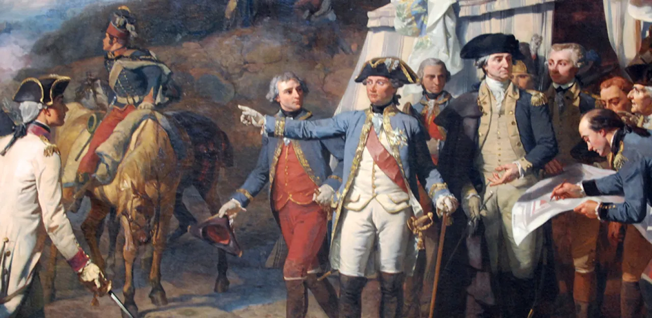 This painting depicts military commanders at the Siege of Yorktown standing in front of a tent, while some lean against a table. They are depicted engaged in animated conversation. 
